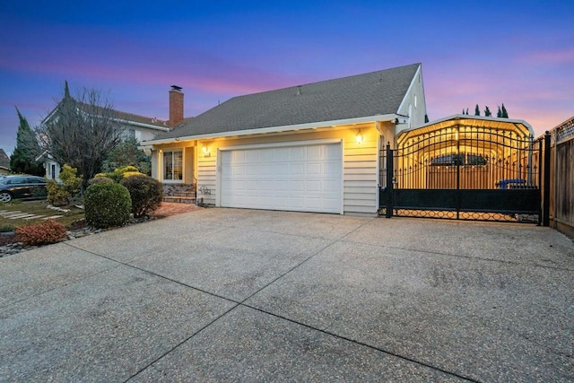 view of front of property with a garage