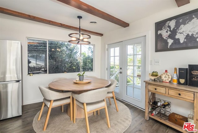 dining space featuring beamed ceiling, dark wood-type flooring, and french doors