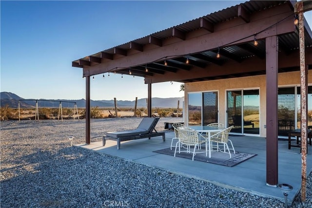 view of patio featuring a mountain view