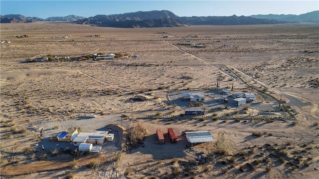 aerial view featuring a mountain view and a rural view