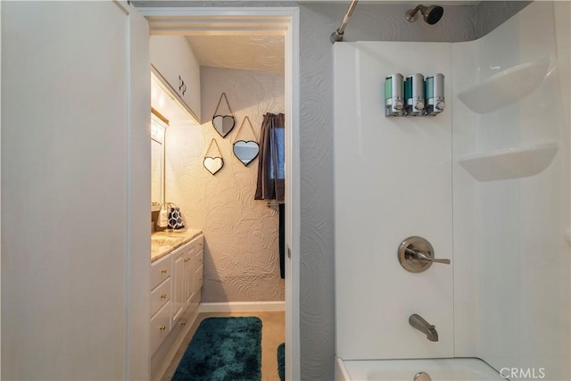 bathroom featuring vanity and bathtub / shower combination