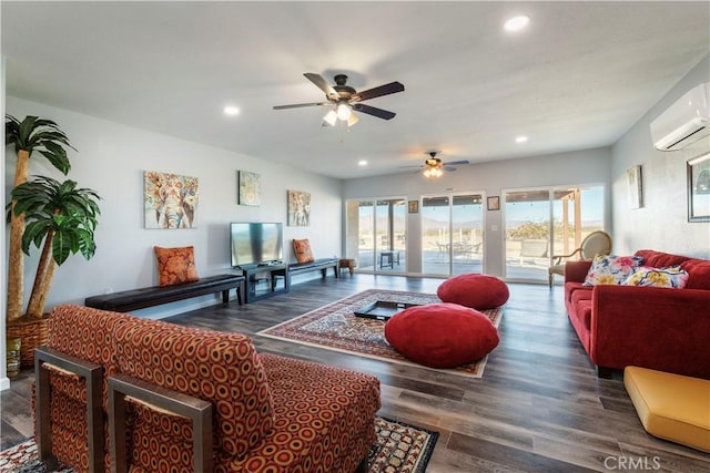 living room with dark hardwood / wood-style flooring and an AC wall unit