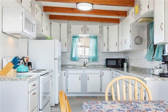 kitchen with white appliances, beam ceiling, decorative backsplash, and white cabinets