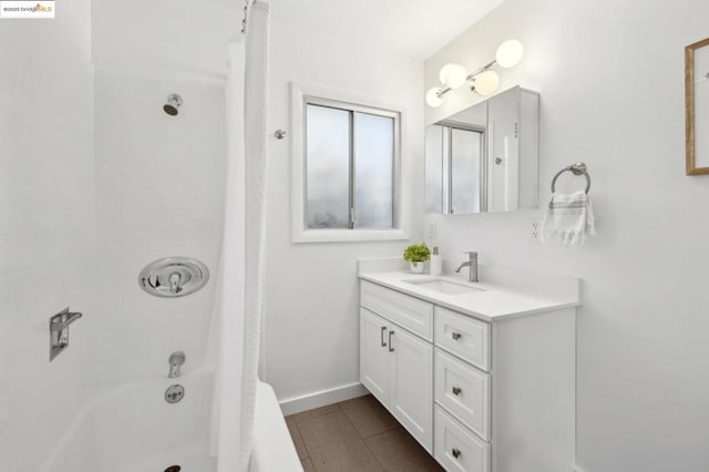 bathroom featuring shower / tub combo with curtain, vanity, and tile patterned flooring