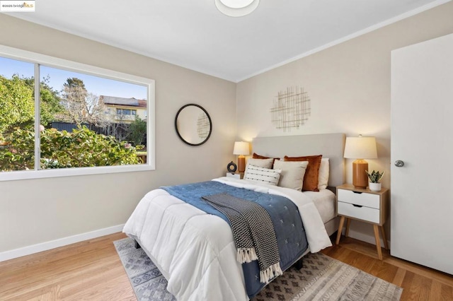 bedroom featuring light hardwood / wood-style floors