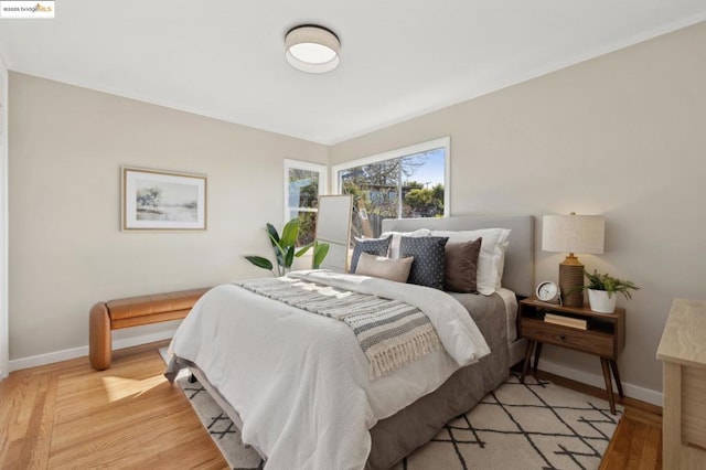 bedroom with light hardwood / wood-style floors