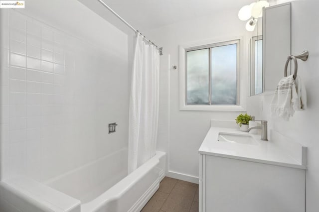 bathroom with shower / bath combination with curtain, tile patterned floors, and vanity