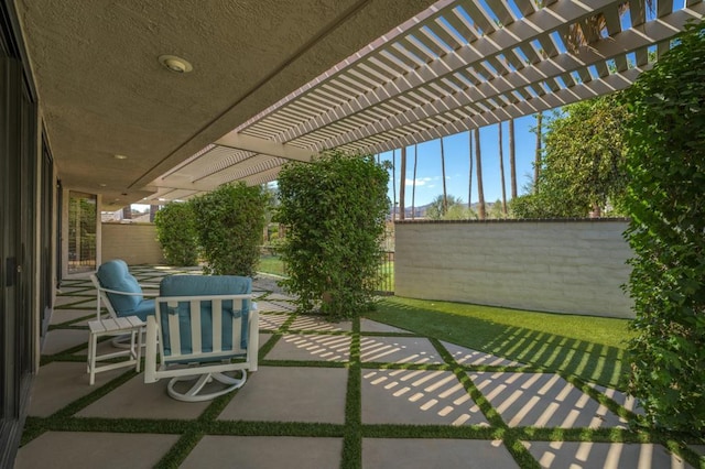 view of patio featuring a pergola