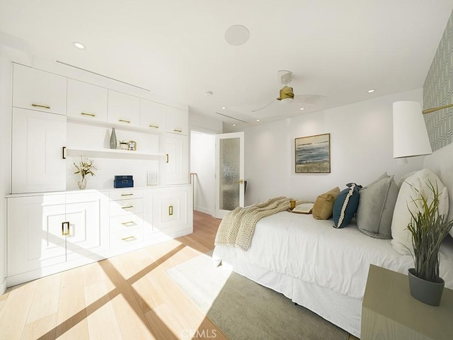 bedroom with ceiling fan and light wood-type flooring