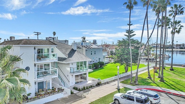 exterior space with a water view