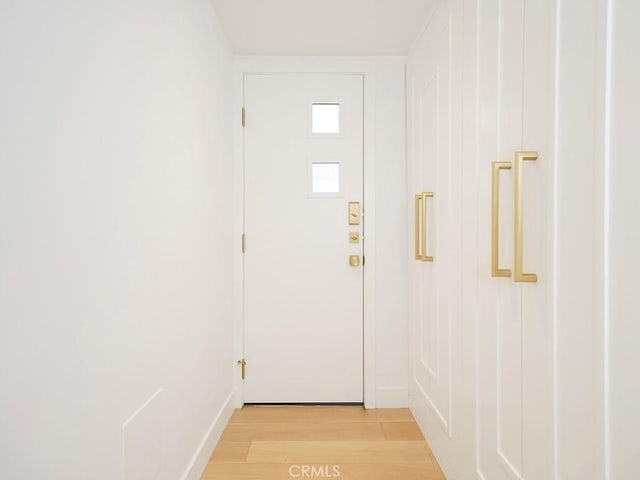 doorway featuring light hardwood / wood-style floors