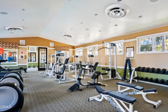 gym with lofted ceiling