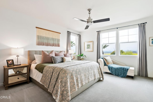 bedroom with ceiling fan and carpet