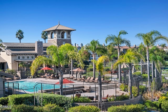 view of swimming pool with a patio area