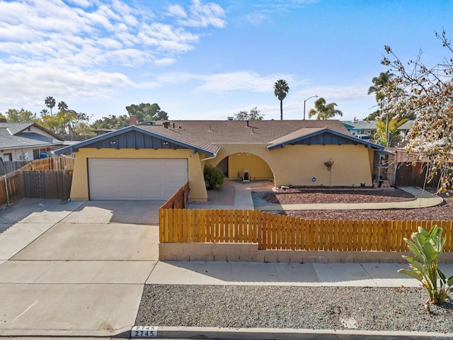 ranch-style house featuring a garage