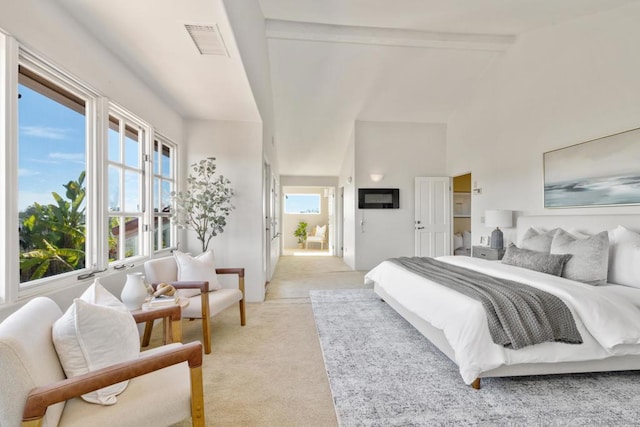 carpeted bedroom with high vaulted ceiling and beam ceiling