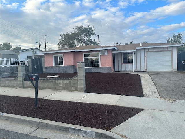 single story home with a garage