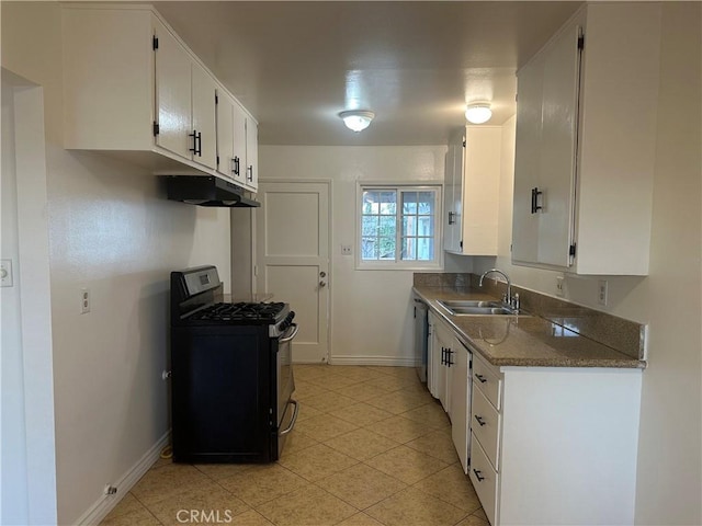 kitchen featuring sink, white cabinetry, gas range oven, stainless steel dishwasher, and dark stone counters