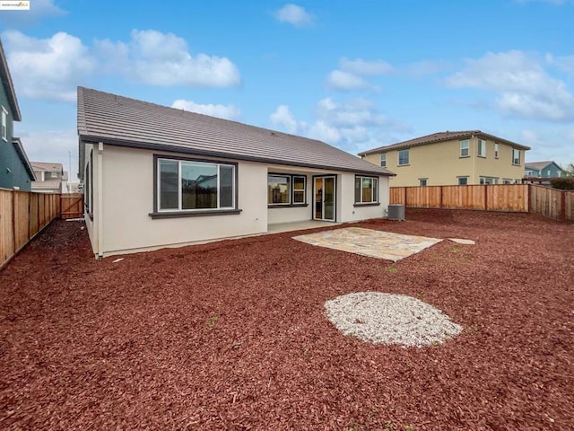 back of house featuring a patio