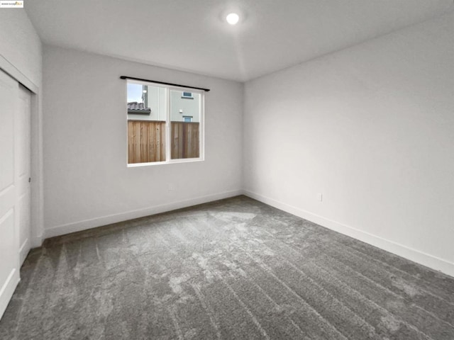 spare room with carpet