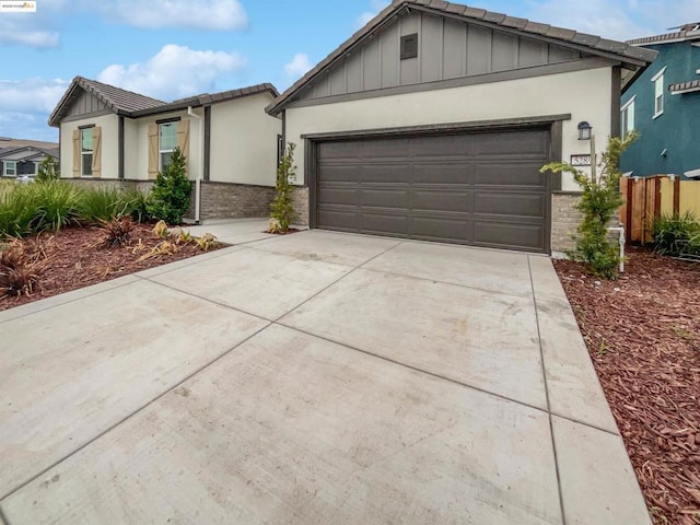 ranch-style home with a garage