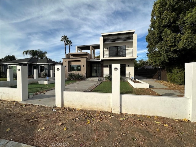 contemporary house featuring a balcony