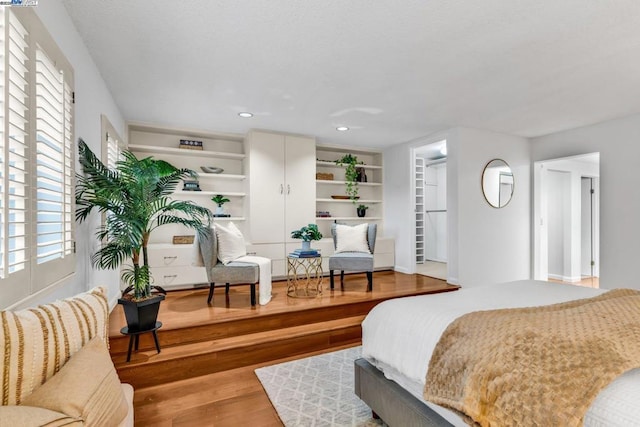 bedroom featuring hardwood / wood-style floors