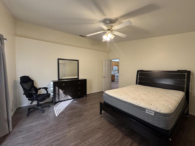 bedroom with dark wood-type flooring and ceiling fan