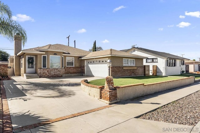 ranch-style home featuring a garage