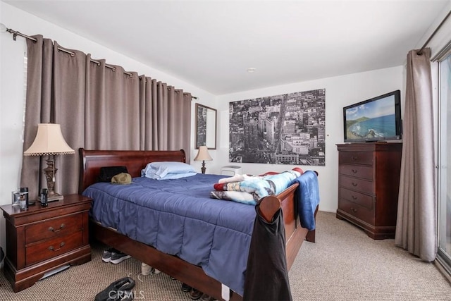 bedroom with light colored carpet