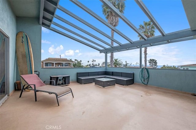 view of patio / terrace featuring a pergola and an outdoor living space with a fire pit