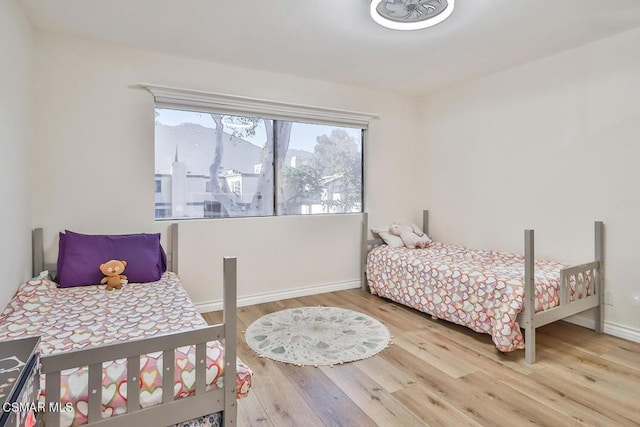 bedroom featuring wood-type flooring