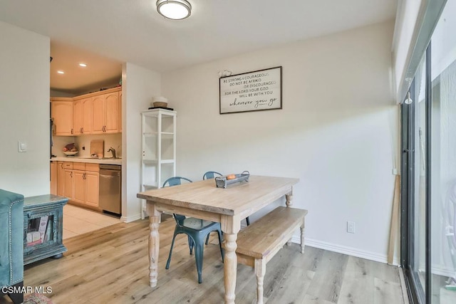 dining room featuring light wood-type flooring