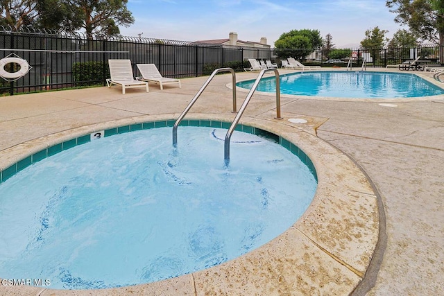 view of pool featuring a patio area