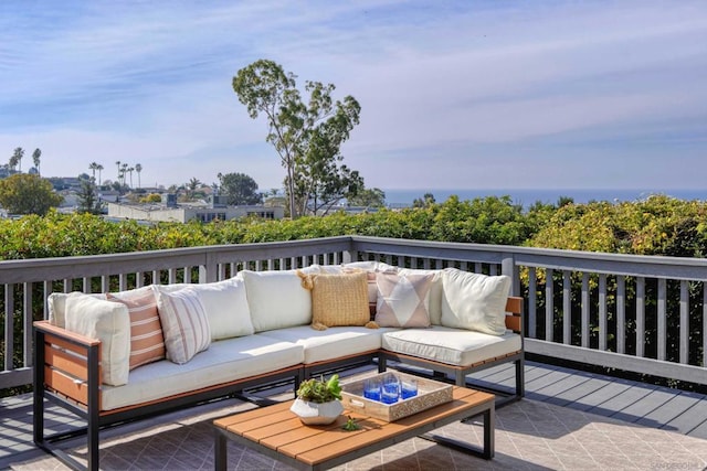 wooden deck featuring outdoor lounge area