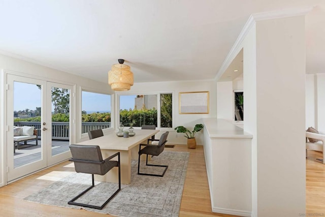 sunroom featuring french doors