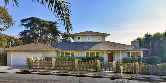 view of front of home with a garage