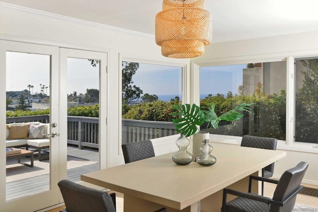 sunroom featuring french doors