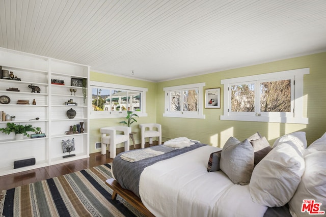 bedroom featuring dark hardwood / wood-style floors