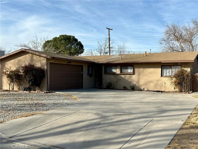 single story home featuring a garage