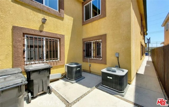 view of patio featuring central air condition unit