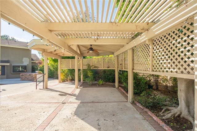 view of patio / terrace featuring ceiling fan and a pergola