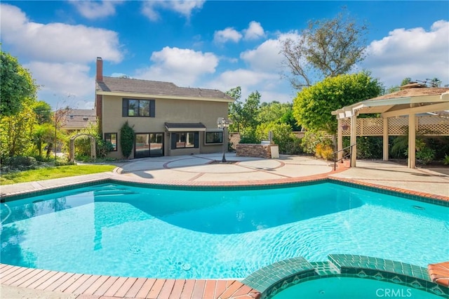 view of swimming pool featuring a gazebo and a patio area