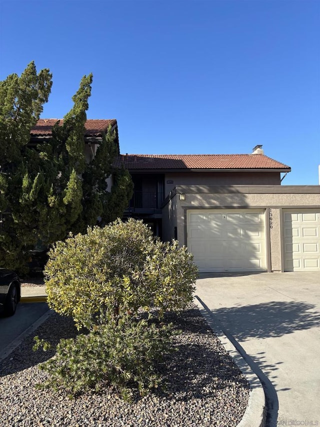 view of front of property featuring a garage