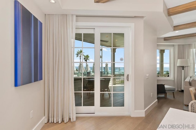 doorway to outside with hardwood / wood-style flooring