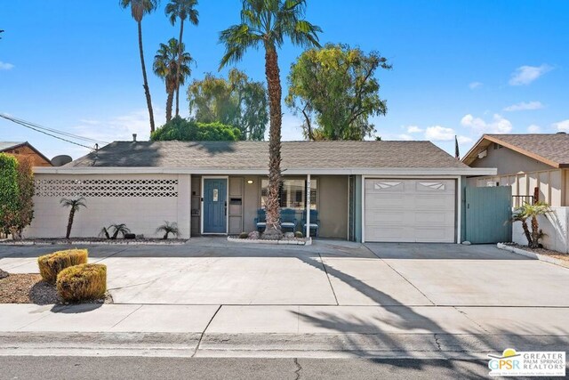 ranch-style home with a garage