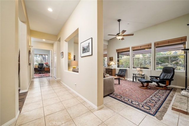 hall featuring light tile patterned floors