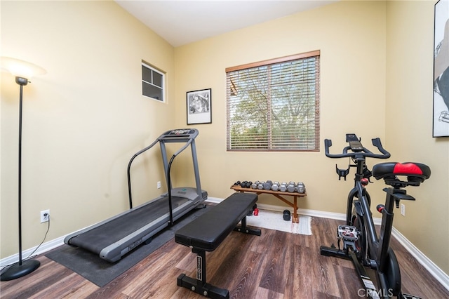 workout area with hardwood / wood-style flooring