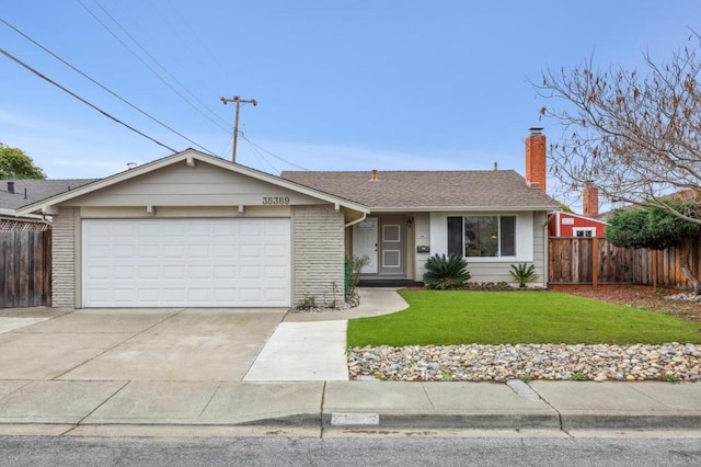 ranch-style home featuring a garage and a front lawn