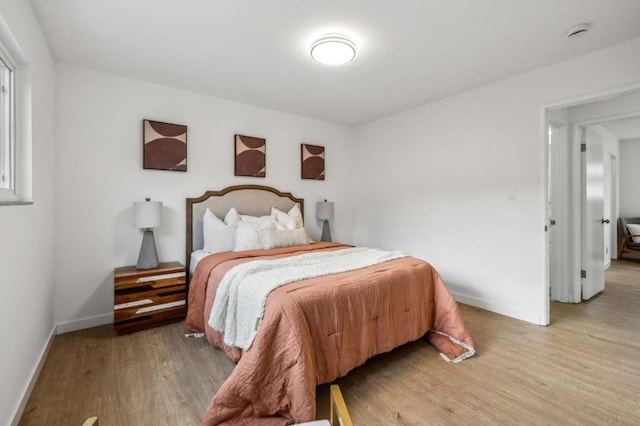 bedroom featuring light wood-type flooring